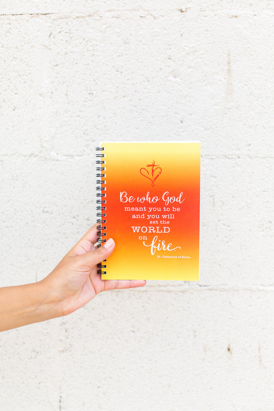 Be who God meant you to be and you will Set the World on Fire. St. Catherine of Sienna Notebook